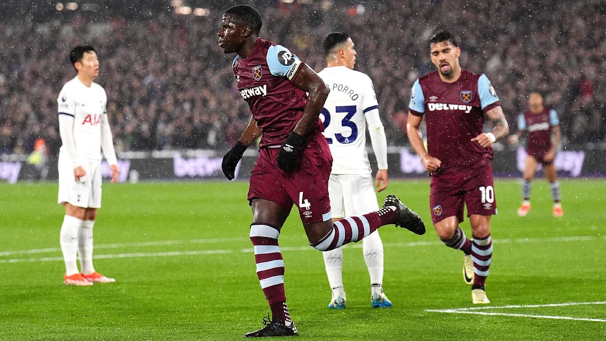 Photo: John Walton/PA : Kurt Zouma celebrates after scoring West Ham’s equaliser.