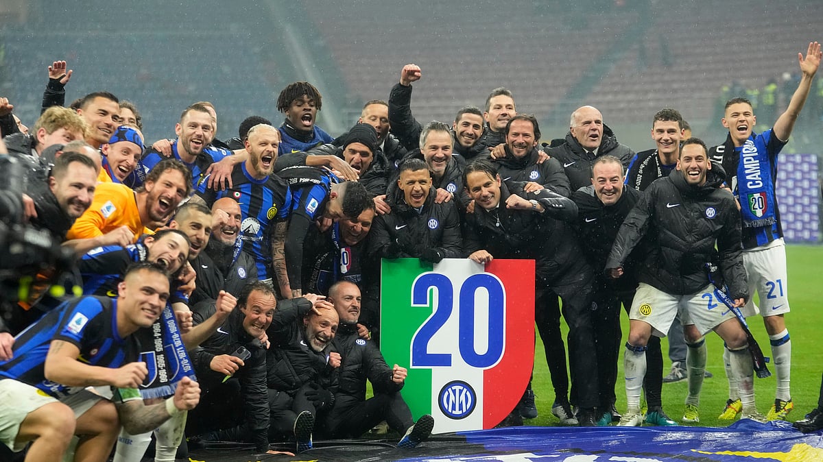 Luca Bruno/AP : Inter Milan celebrate winning their 20th Serie A title. Head coach Simone Inzaghi, center right, and other team members at the end of their match against AC Milan at the San Siro stadium in Milan, Italy, on April 22, 2024.