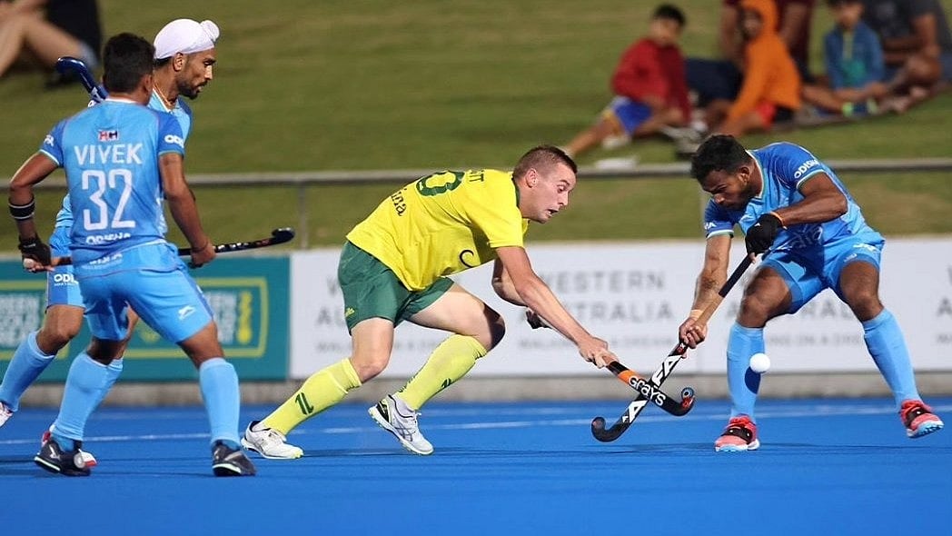 X/TheHockeyIndia : Indian men's hockey team in action against the Kookaburras.