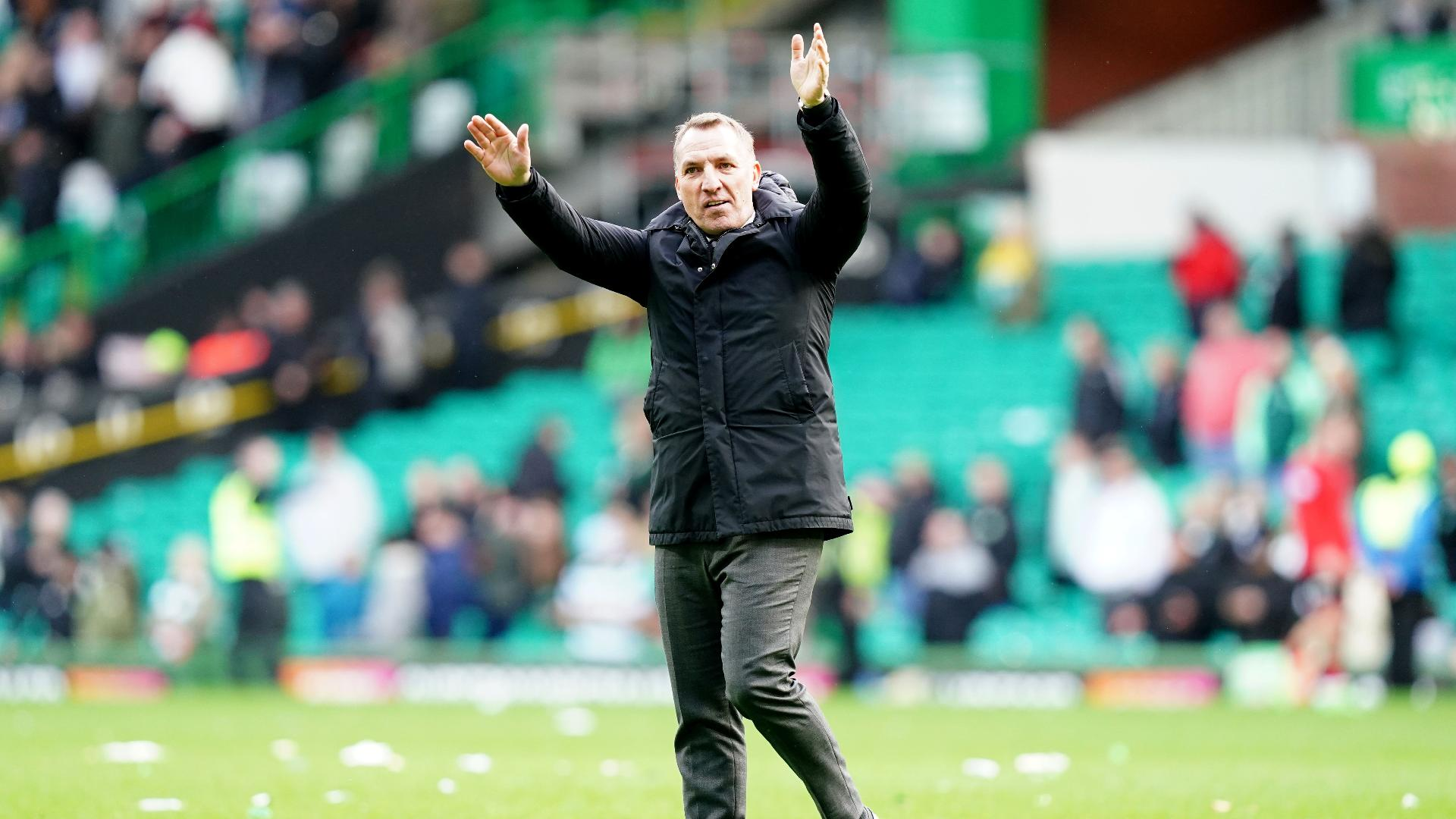  Jane Barlow/PA : Brendan Rodgers, the Celtic manager, greets the crowd after a 3-0 win.