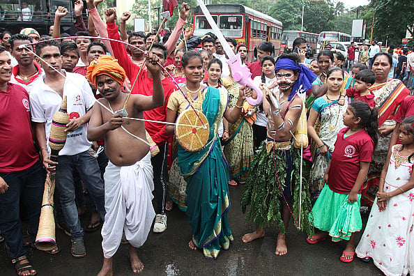 Getty Images : On the occasion of Adivasi day, a rally was taken out by the members of the indigenous tribes in Thane, on August 9, 2019 in Mumbai, India. 