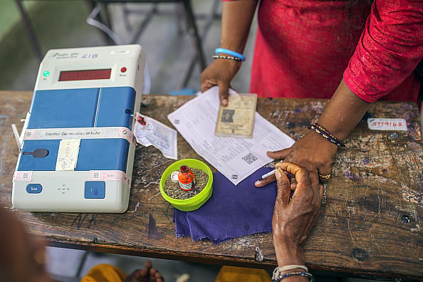 Voters seen standing in queues to cast their votes in the First Phase of Lok Sabha elections 2024 at a Polling station on April 19, 2024 in Muzaffarnagar - Getty Images
