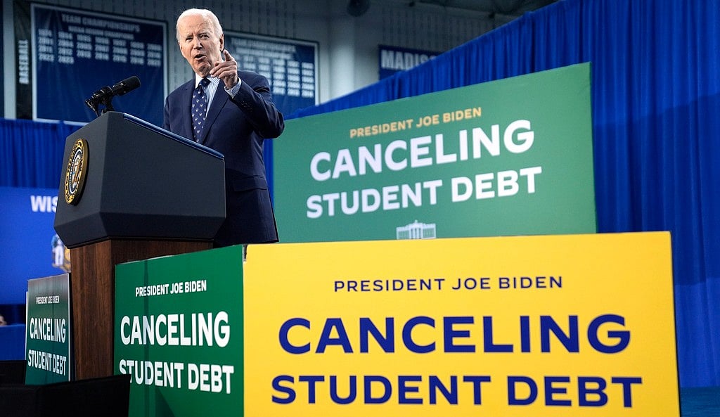 AP : President Joe Biden delivers remarks on student loan debt at Madison College, Monday, April 8, 2024, in Madison.