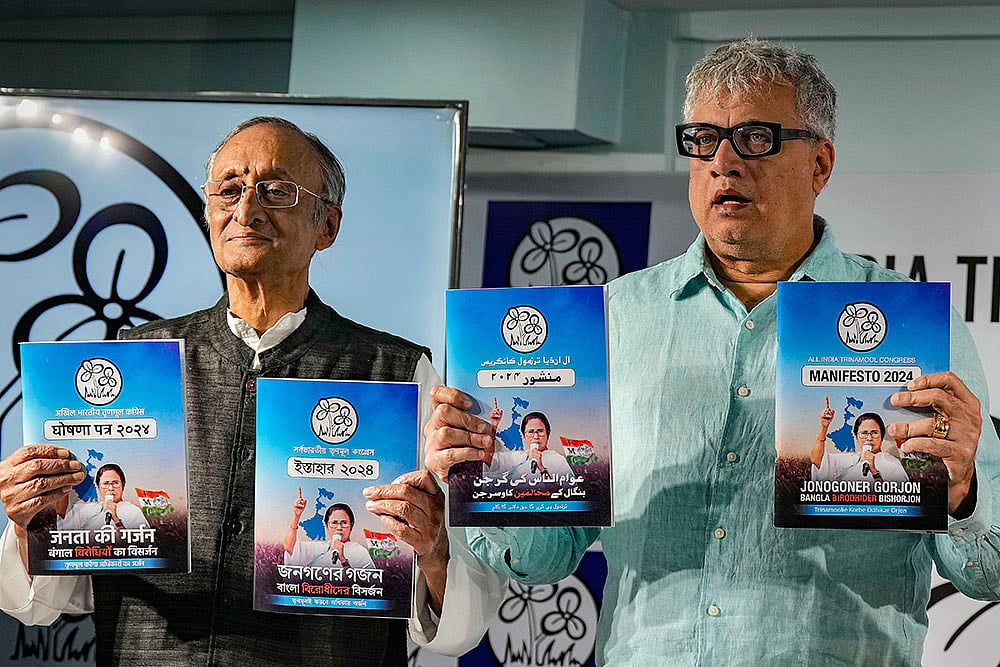 Photo: PTI/Swapan Mahapatra : LS polls: TMC releases election manifesto