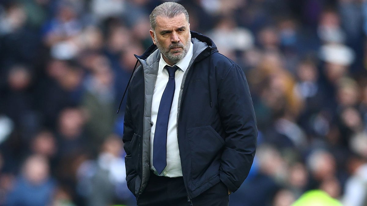 Ange Postecoglou looks on - null