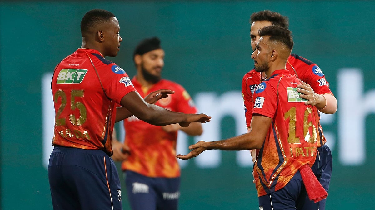 Punjab Kings' Harshal Patel, right, celebrates the dismissal of Mumbai Indians' Mohammad Nabi during the Indian Premier League cricket match between Punjab Kings' and Mumbai Indians in Mullanpur. - AP Photo/ Surjeet Yadav