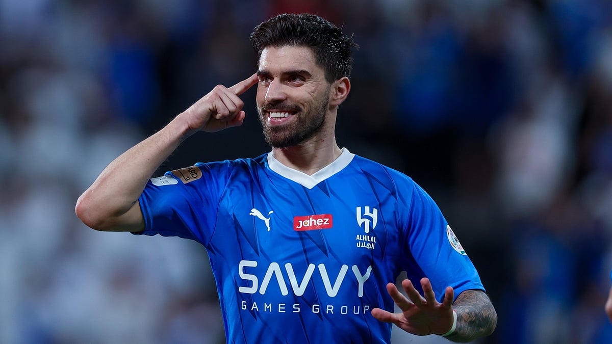 Ruben Neves celebrates his goal.