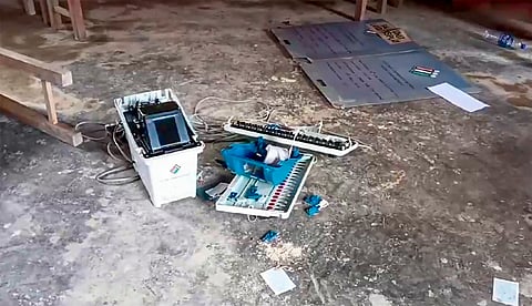 A broken EVM at a polling booth after incidents of violence during 1st phase of polling in Manipur on Friday