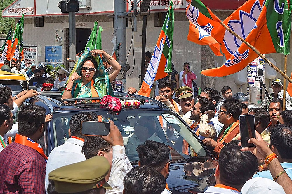 Photo: PTI : Hema Malini's roadshow in Mathura
