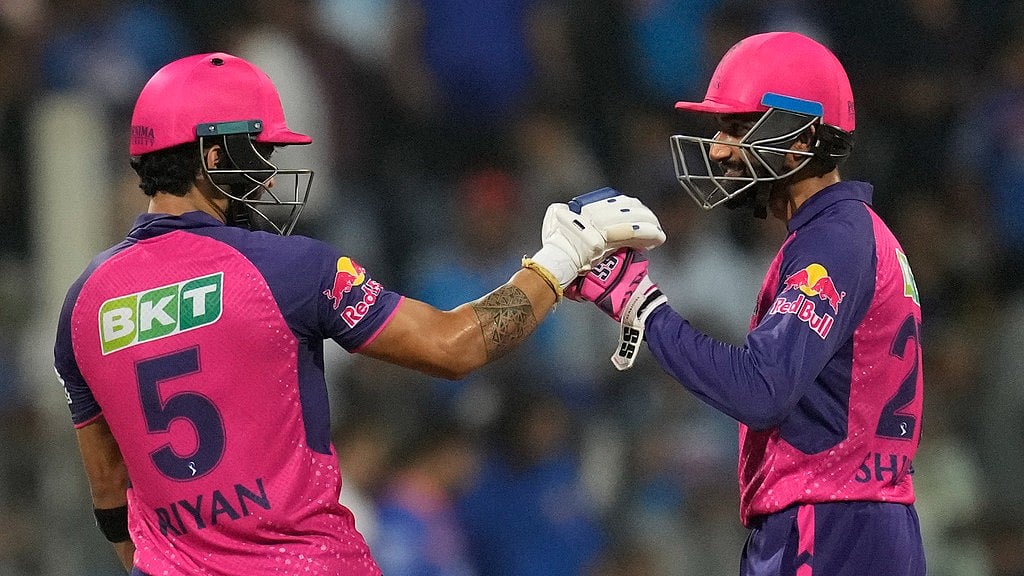 Rajasthan Royals' Riyan Parang, left, celebrates with batting partner Shubham Dubey after their win in the Indian Premier League cricket match between Mumbai Indians and Rajasthan Royals in Mumbai, India, Monday, April. 1, 2024. - (AP Photo/ Rafiq Maqbool)
