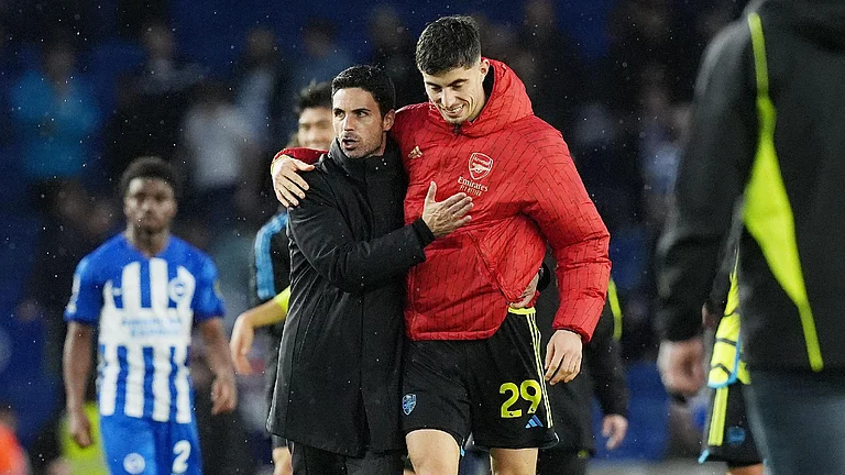 Mikel Arteta (left) hailed his players’ performance. - Gareth Fuller/PA