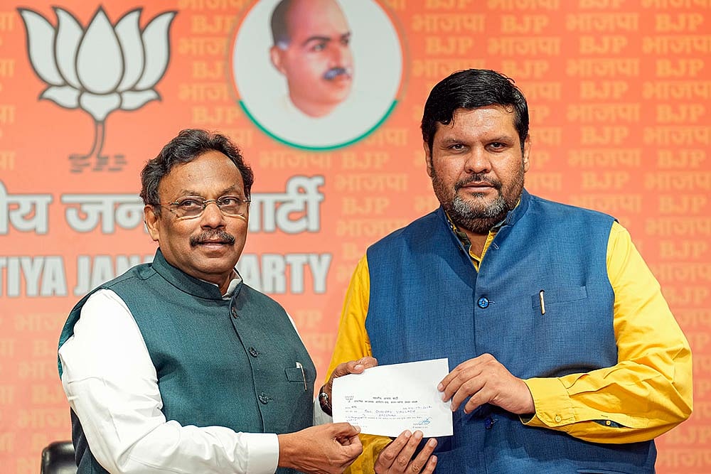 Photo: PTI/Kamal Singh : Gourav Vallabh joins BJP