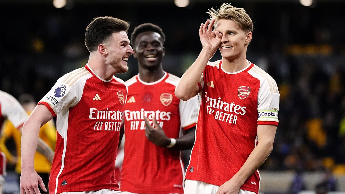 Arsenal’s Martin Odegaard celebrates his goal at Wolves. - Nick Potts/PA