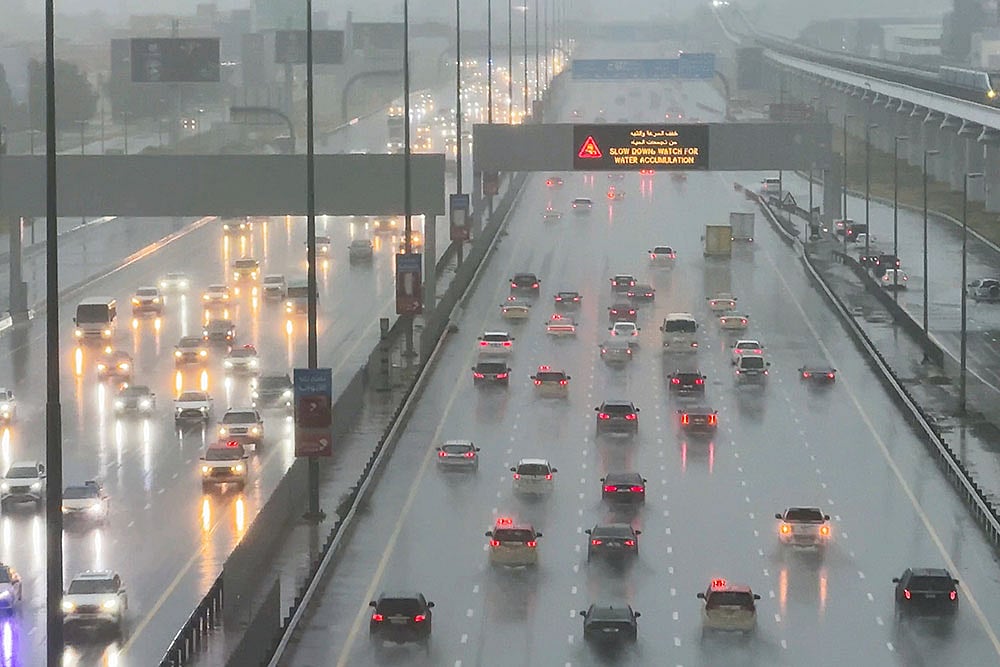Photo: AP/Jon Gambrell : Dubai Floods