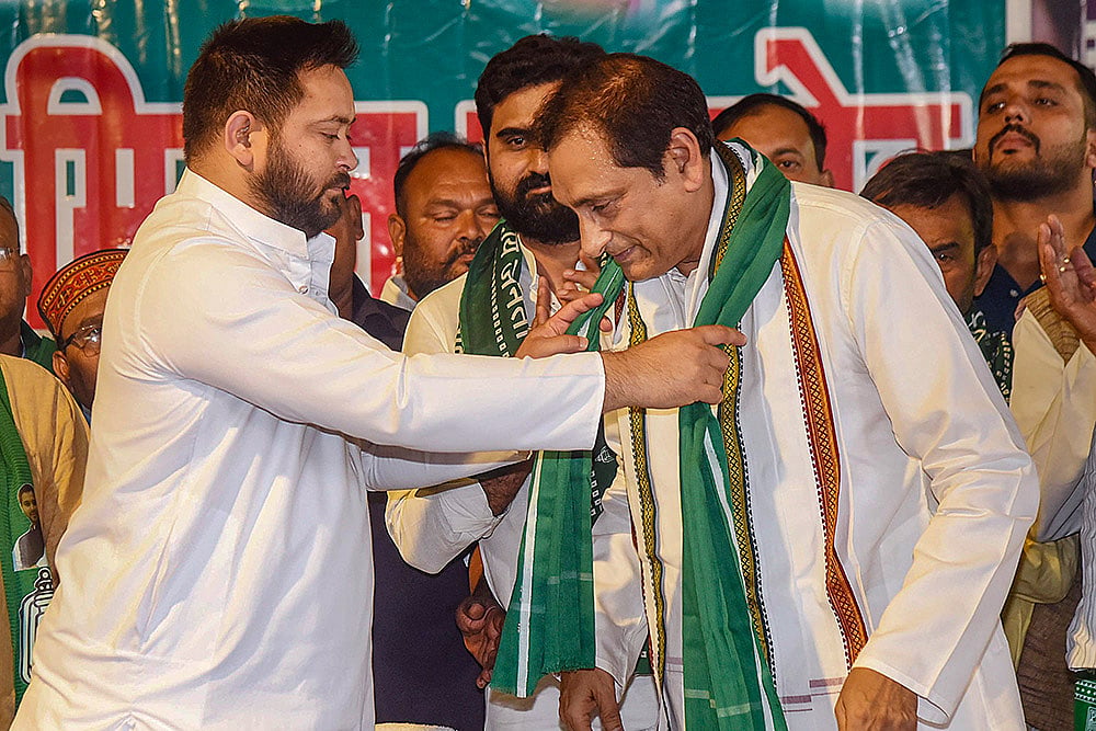 Photo: PTI : Mehboob Ali Kaiser joins RJD