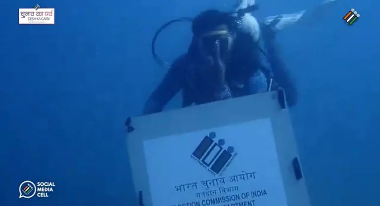 Scuba divers swim deep into the Arabian Sea to display a placard
- TN elections CEO