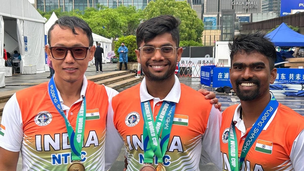 India's gold-winning men's recurve trio of (left to right) Tarundeep Rai, Dhiraj Bommadevara and Pravin Jadhav at the Archery World Cup Stage 1 in Shanghai. - X/SAI Media