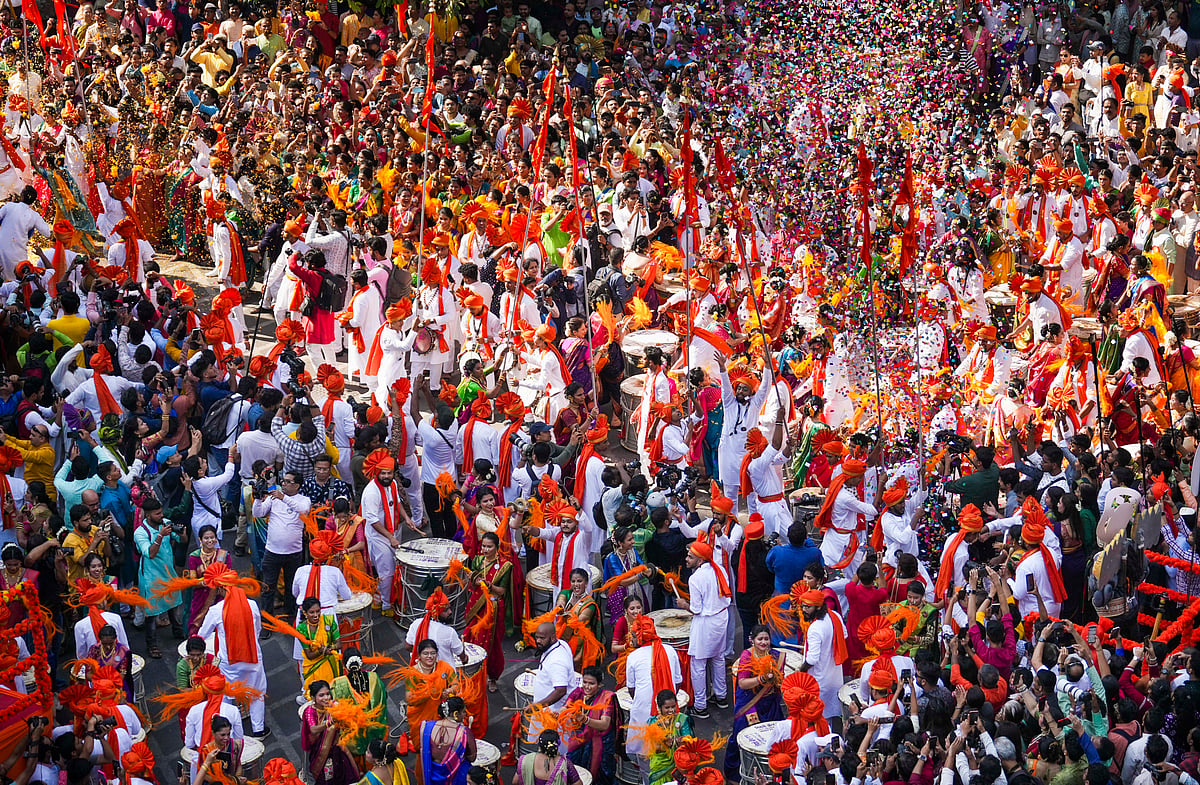 PTI : Mumbai: People dressed in traditional attire participate in a rally on the occasion of 'Gudi Padwa', the Maharashtrian New Year, at Girgaon in Mumbai, Tuesday, April 9, 2024