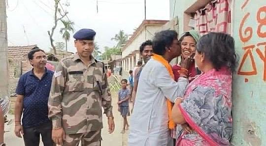 BJP MP Khagen Murmu landed in a controversy after he kissed a woman during his election campaign.