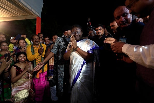 Getty's Images : Droupadi Murmu greet her supporters after being elected as country's new president in New Delhi on July 21, 2022.