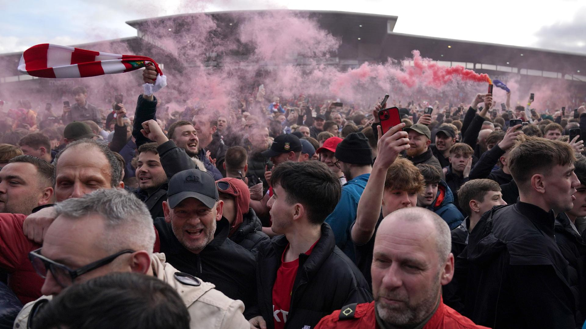 Wrexham fans celebrate promotion. - Jacob King/PA