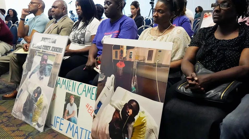 Families of victims- Michael Corey Jenkins and Eddie Terrell Parker - AP