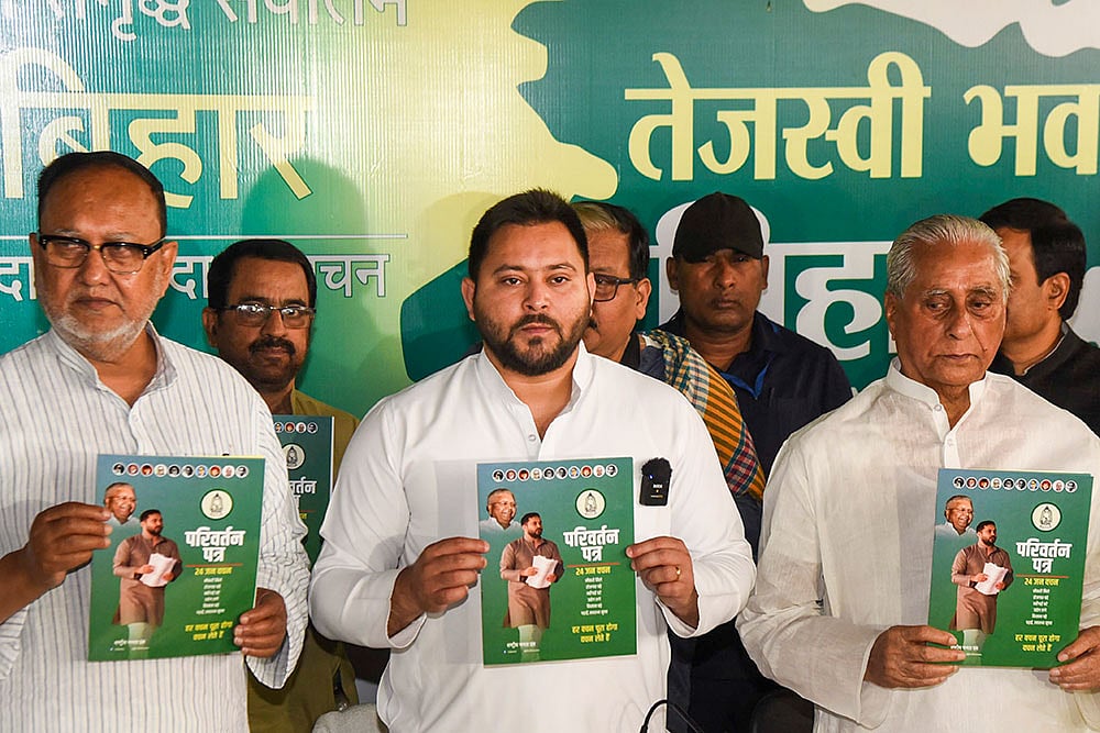 Photo: PTI : RJD releases Parivartan Patra