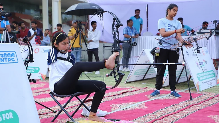Sheetal Devi (left) in action at the Khelo India NTPC national ranking archery meet at the DDA Yamuna Sports Complex, Surajmal Vihar. - SAI