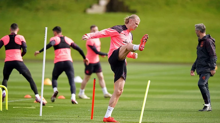 Manchester City's Erling Haaland takes part in a training session at the City Football Academy, in Manchester, England, Monday April 8, 2024, ahead of a Champions League Quarter final, leg 1 soccer match against Real Madrid on Tuesday. - (Mike Egerton/PA via AP)