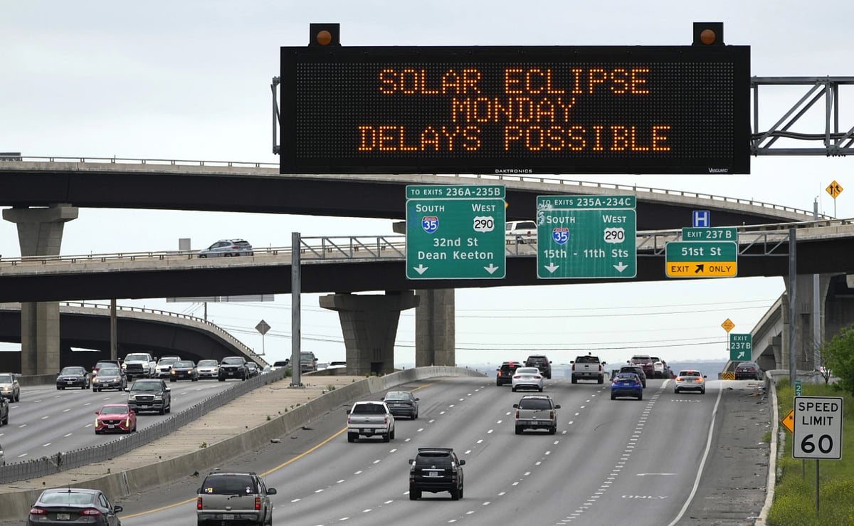 AP : Motorists travelling are reminded of possible traffic delays due to solar eclipse. 