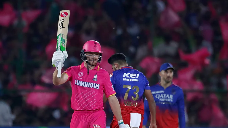 Rajasthan Royals' Jos Buttler celebrates scoring fifty runs during the Indian Premier League cricket match between Rajasthan Royals and Royal Challengers Bangaluru in Jaipur, India, Saturday, April 6, 2024. (AP Photo/Pankaj Nangia)
- null