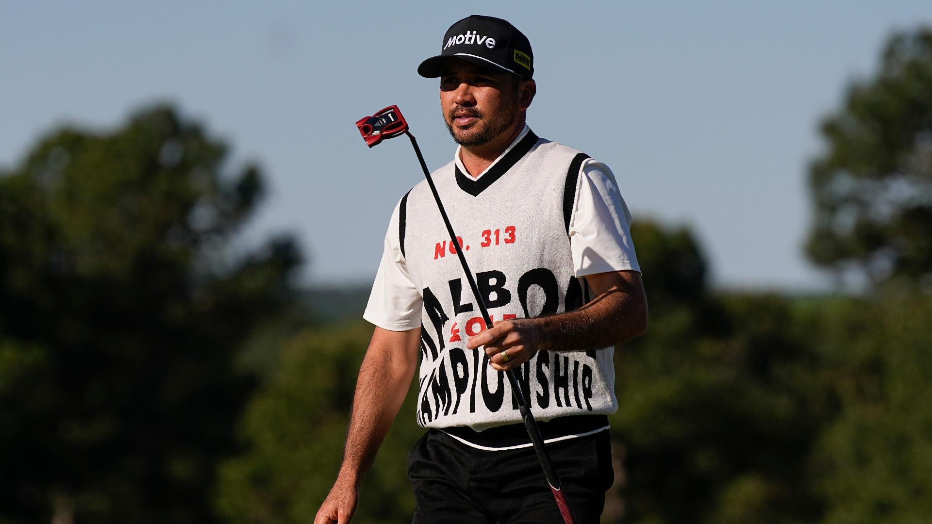 Jason Day wore the sleeveless jumper on the first day at Augusta. - George Walker IV/AP