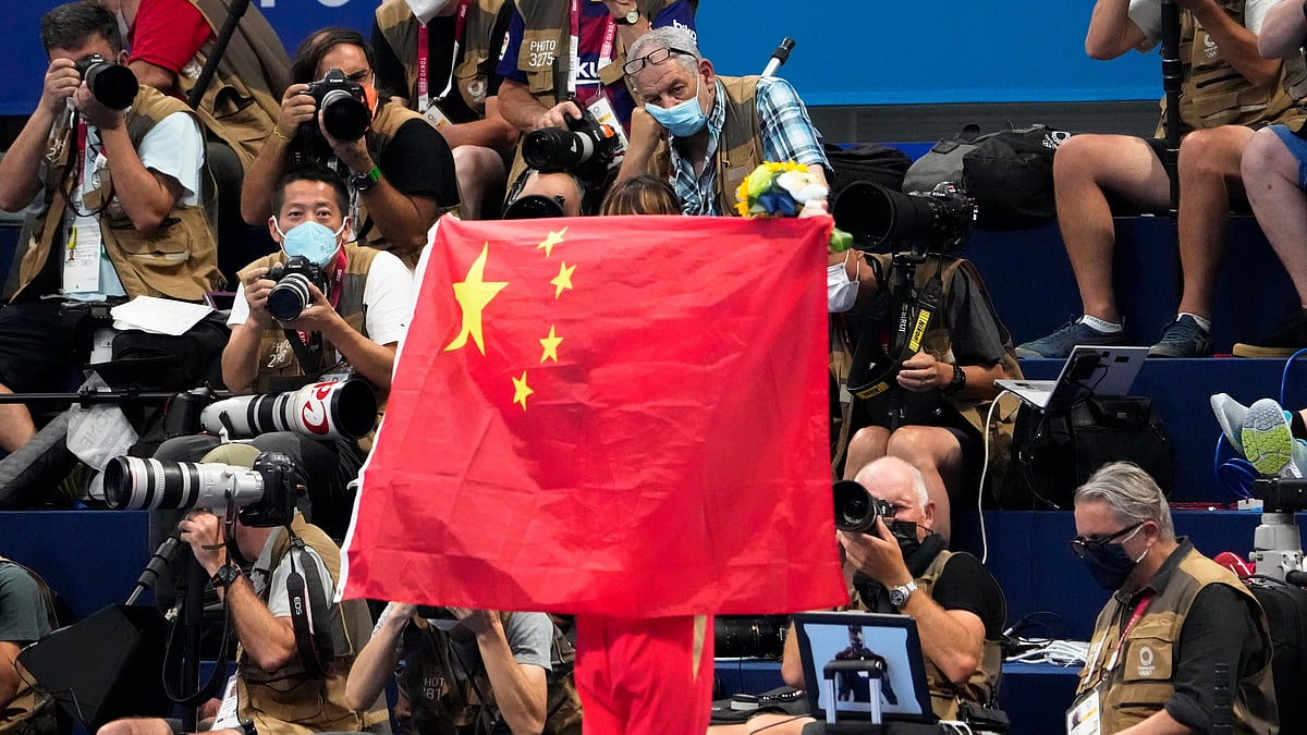 AP : World Anti-Doping Agency clears 23 Chinese swimmers to compete at Tokyo Olympics.