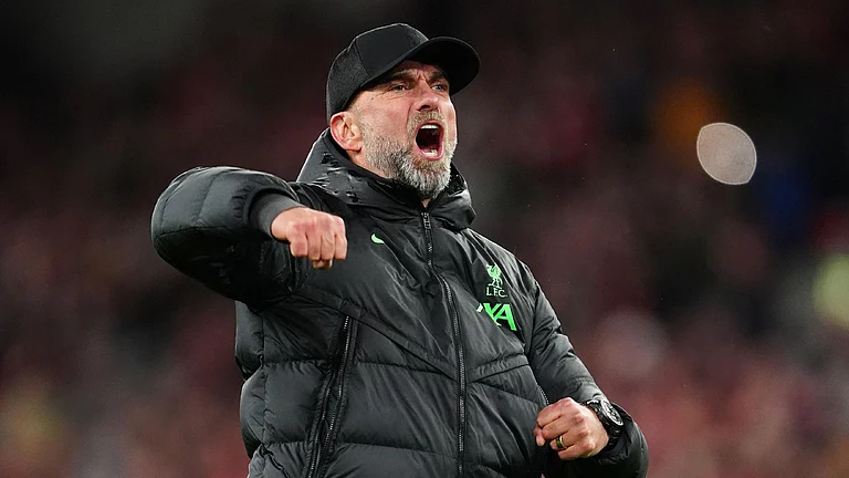 Liverpool manager Jurgen Klopp celebrates following the win over Sheffield United. - Peter Byrne/PA