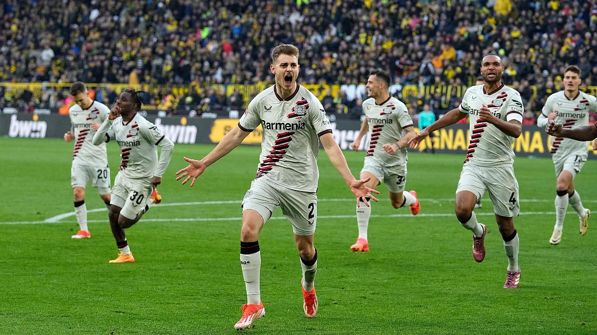 Martin Meissner/AP : Josip Stanisic scored a last-minute winner as Bayer Leverkusen drew 1-1 with Borussia Dortmund.