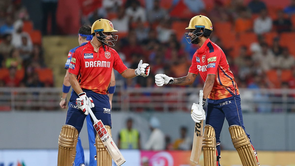 AP Photo/ Surjeet Yadav : Punjab Kings' Ashutosh Sharma, left, chats with his batting partner Harpreet Brar during the Indian Premier League cricket match between Punjab Kings' and Mumbai Indians in Mullanpur.