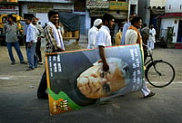 Elections Campaigns Of 2004 And 2024: Does The Past Hold The Key To Reveal The Future? Getty Images : A Bhartiya Janata Party (BJP) supporter carries a picture of Indian Prime Minister and BJP leader Atal Bihari Vajpayee after an election rally in Aligarh, India Thursday, April 29, 2004. Vajpayee and his BJP were ousted from power yesterday in an election upset when the nation's 700 million poor voted against his "India Shining" campaign