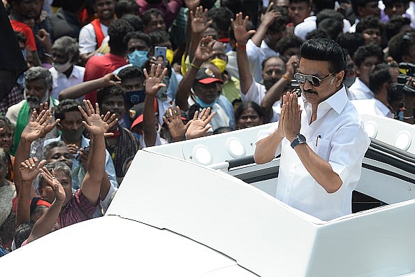 Getty Images : Dravida Munnetra Kazhagam (DMK) party president M.K. Stalin (R) speaks during an election campaign rally ahead of the Tamil Nadu state legislative assembly elections, in Chennai on April 4, 2021