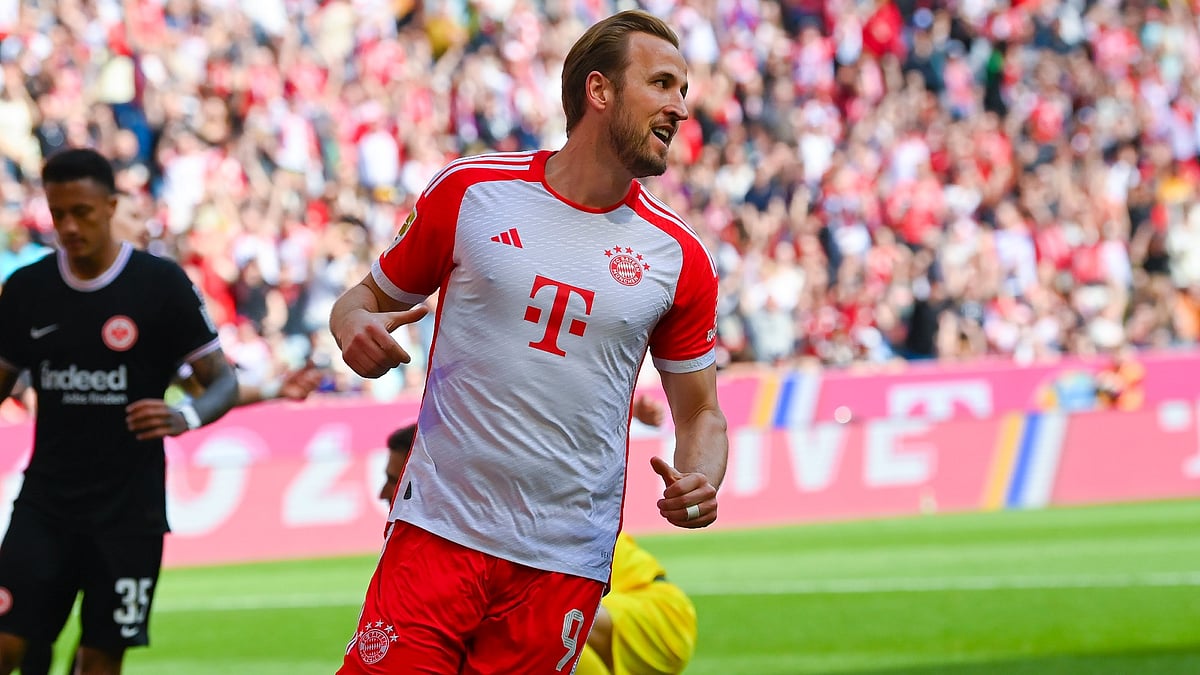 Harry Kane celebrates after scoring the first of his two goals against Eintracht Frankfurt - null