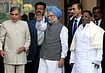 Dr. Manmohan Singh, Whose Silence Spoke Louder Than The Words of Many RAVEENDRAN/AFP via Getty Images : Indian Prime Minister Manmohan Singh (C) arrives for the winter session of Parliament in New Delhi on November 19, 2009