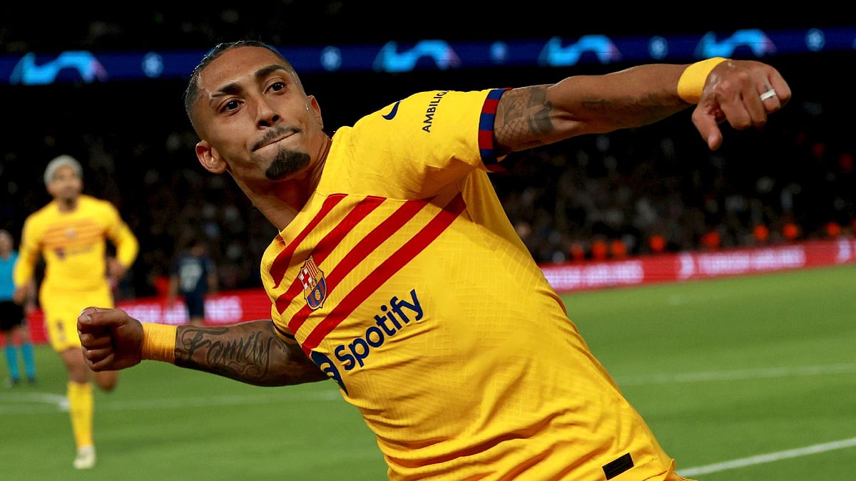 Raphinha celebrates scoring his second goal against Paris Saint-Germain at Parc des Princes. - Aurelien Morissard/AP