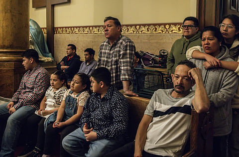 Parishioners attend Easter mass at Sacred Heart of Jesus