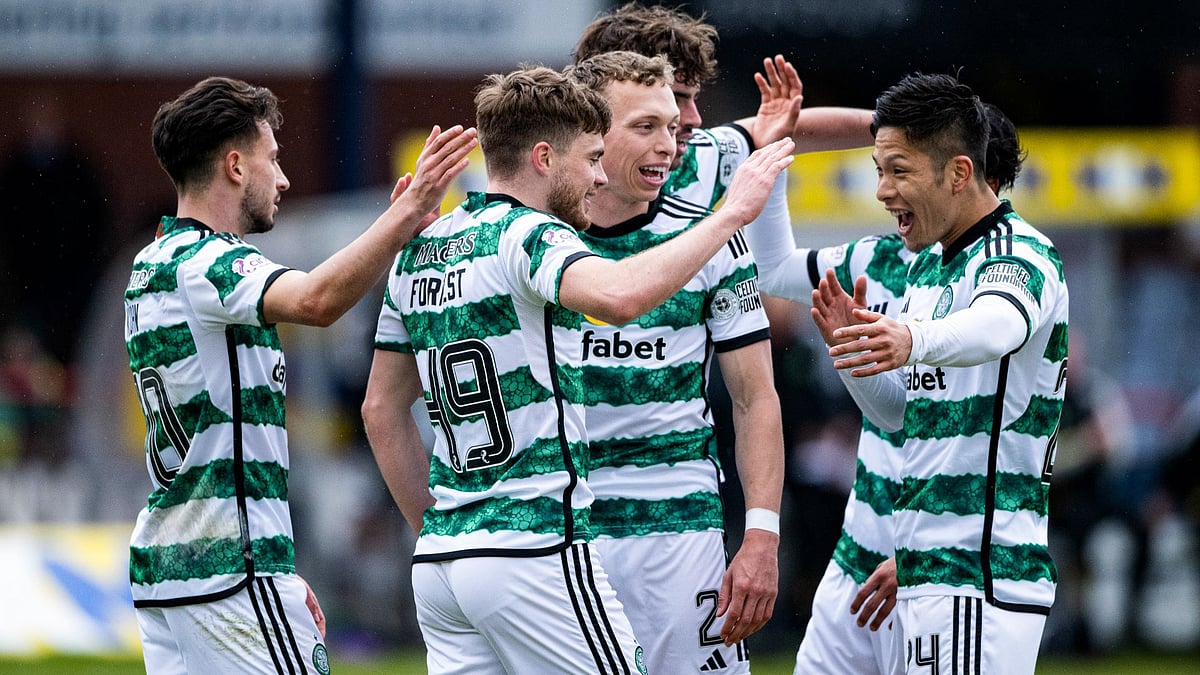 Celtic celebrate at Dens Park