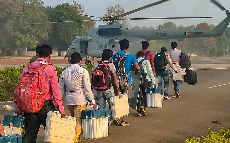 Polling officials with EVMs and other election material leave for poll duty, ahead of Lok Sabha elections, in Sukma district, Chhattisgarh, Tuesday, April 16 - PTI
