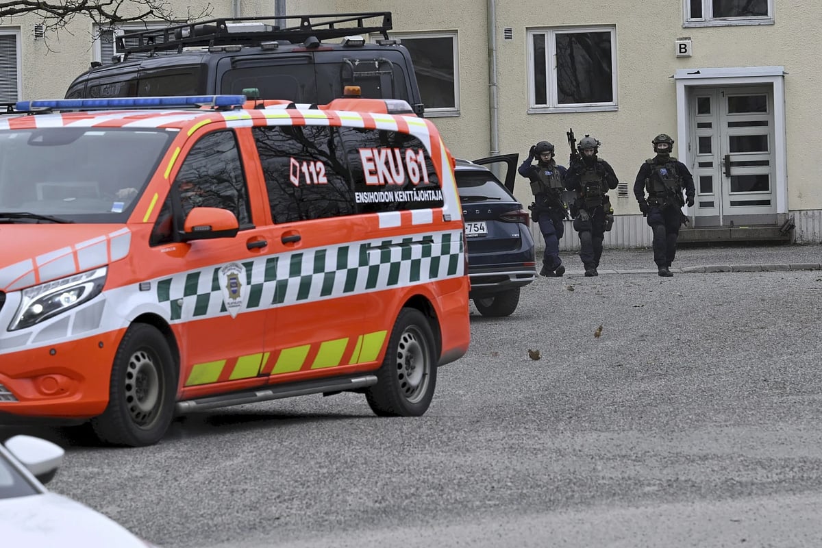 AP : Police officers at the scene of shooting in Finland |