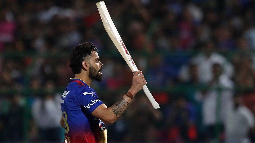 Royal Challengers Bengaluru's Virat Kohli acknowledges the crowd as he walks off the field unbeaten scoring a century at the end of their innings in the Indian Premier League cricket match between Rajasthan Royals and Royal Challengers Bangaluru in Jaipur, India, Saturday, April 6, 2024. - AP