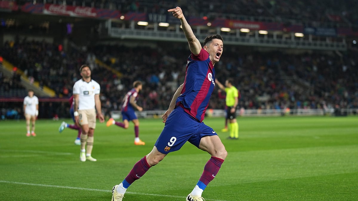 Robert Lewandowski scored a second-half hat-trick for Barcelona in the La Liga game against Valencia.
