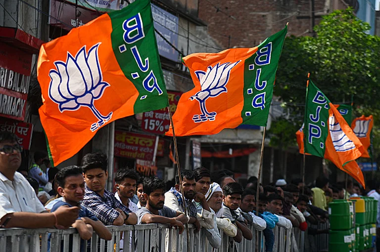 People are waiting for the arrival of Indian Prime Minister Narendra Modi during a roadshow ahead of the Indian General Elections in Ghaziabad, Uttar Pradesh, India, on April 6, 2024. - (Photo by Kabir Jhangiani via Getty Images)