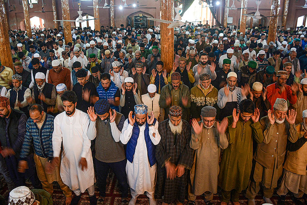Photo: PTI : Two hundred people booked for allegedly causing traffic congestion by offering Namaz on a road