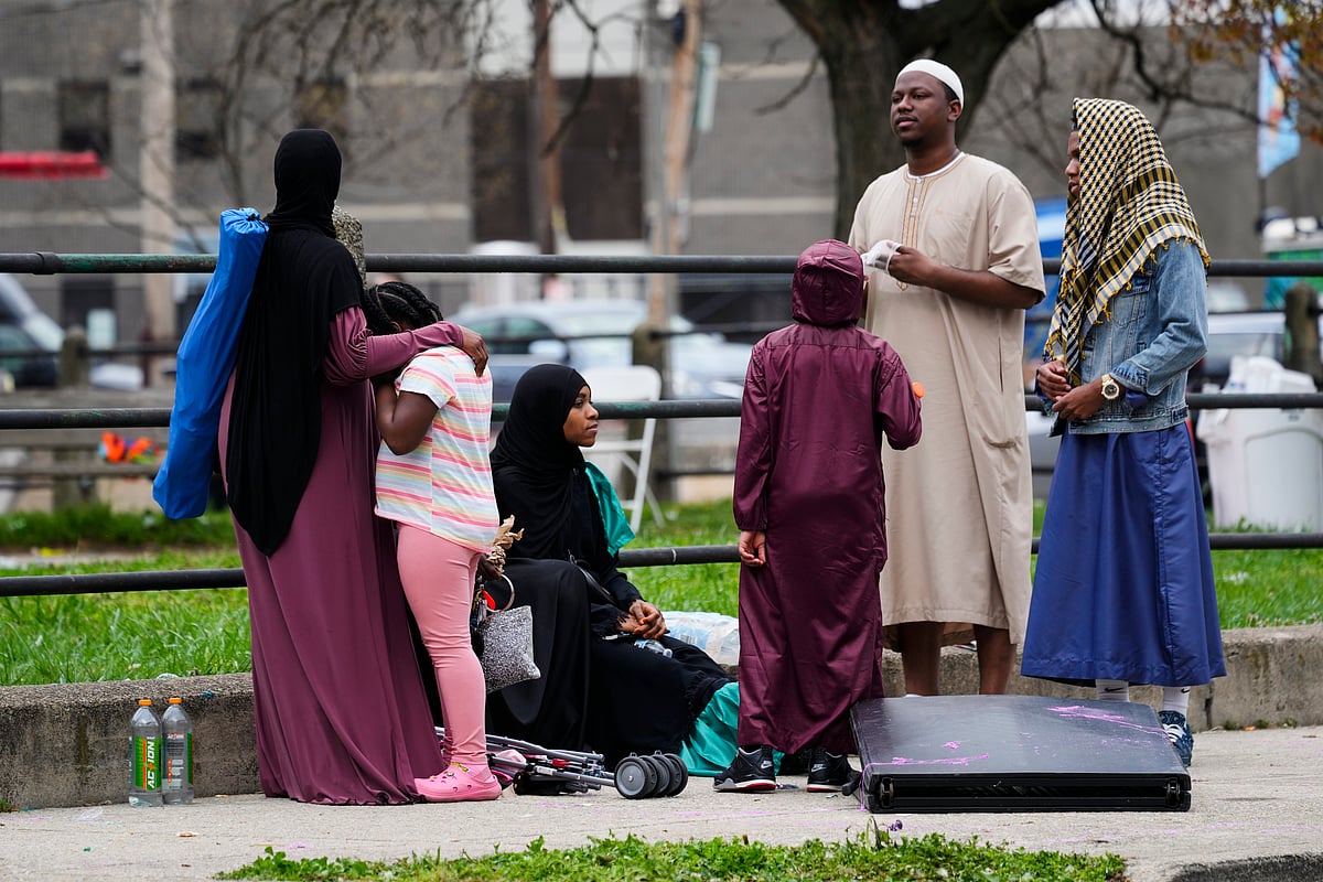 AP : People gather in the aftermath of a shooting at an Eid al-Fitr event in Philadelphia, Wednesday, April 10, 2024. 